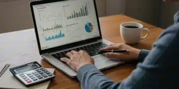 Person planning 401k contributions on laptop for 2026 retirement
