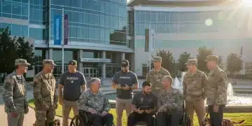 Diverse veterans smiling in front of a modern VA facility, symbolizing new benefit opportunities in 2026.